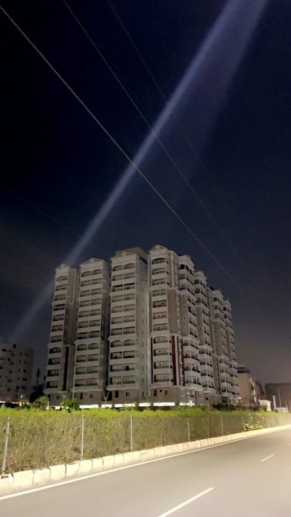 Towers lit up at night